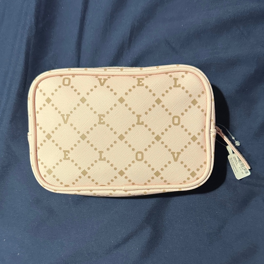 NWT Pink cosmetic pouch by ICING
